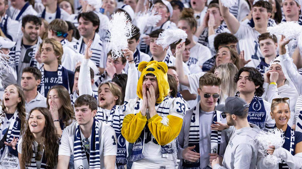 Penn State Nittany Lions fans cheer as their team plays against the Notre Dame Fighting Irish in the first half of their NCAA Playoff Semifinal Capital One Orange Bowl football game at Hard Rock Stadium on Thursday, Jan. 9, 2025, in Miami Gardens, Fla.