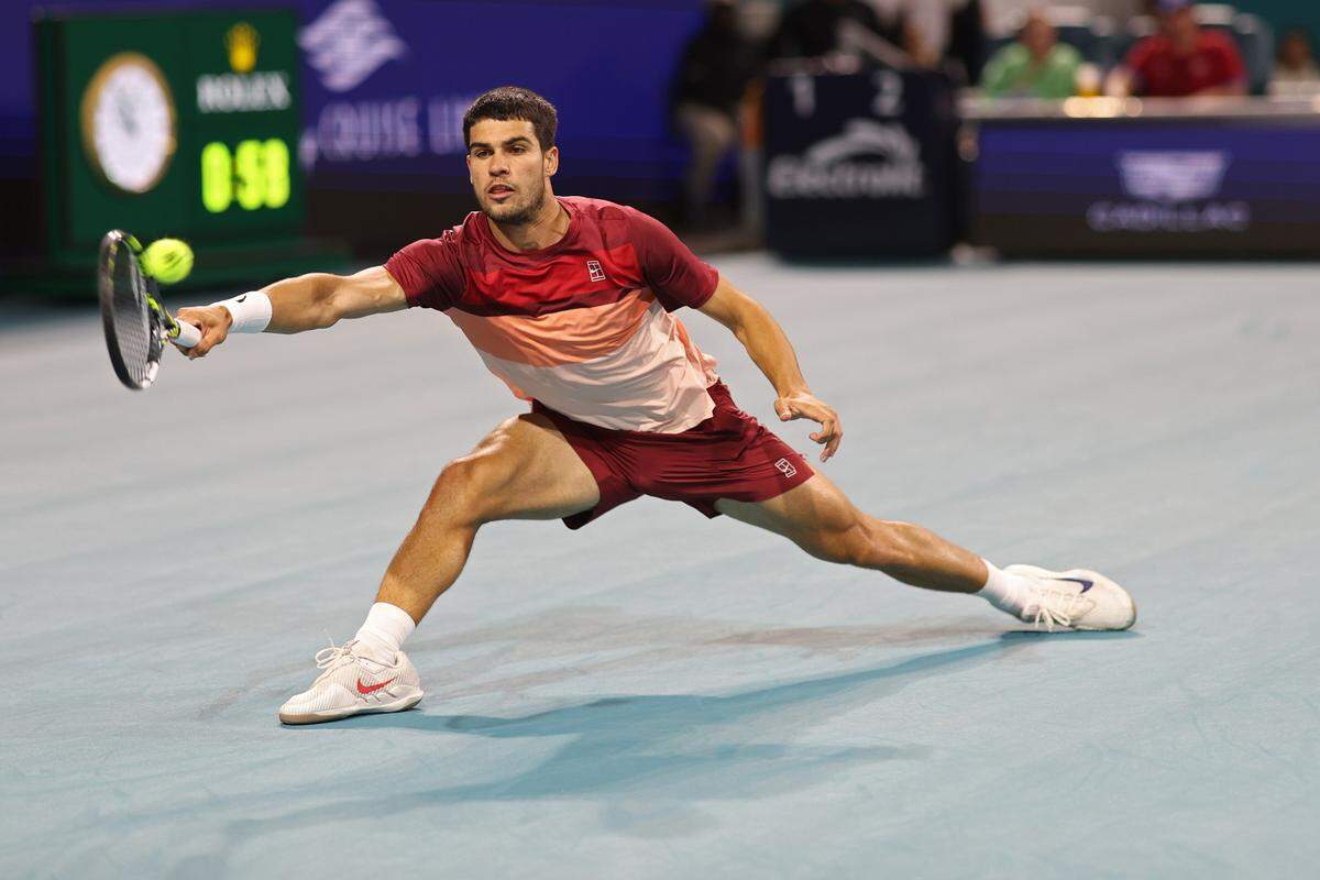 Mar 21, 2025; Miami, FL, USA; Carlos Alcaraz (ESP) reaches for a forehand against David Goffin (BEL)(not pictured) on day four of the Miami Open at Hard Rock Stadium. Mandatory Credit: Geoff Burke-Imagn Images