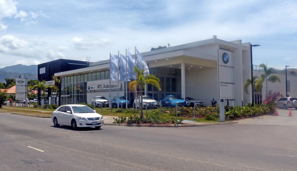 Investments like this 2-year-old BMW showroom have been pouring into Jamaica in the last few years after the country started to pay off its debt.