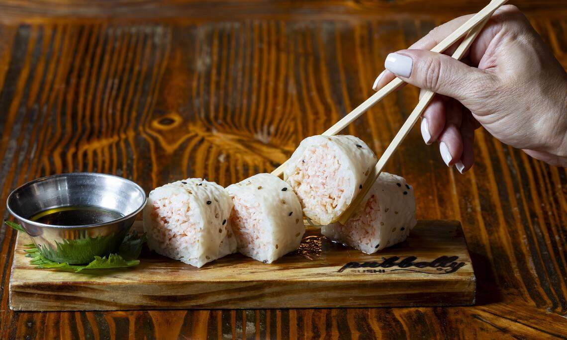 A Butter Krab Roll is photographed at Pubbelly Sushi on Thursday, Sept. 18, 2025, in Miami Beach, Fla. The restaurant is celebrating its 15th anniversary. The roll consists of goma soy paper, kanikama, ponzu and warm clarified butter.