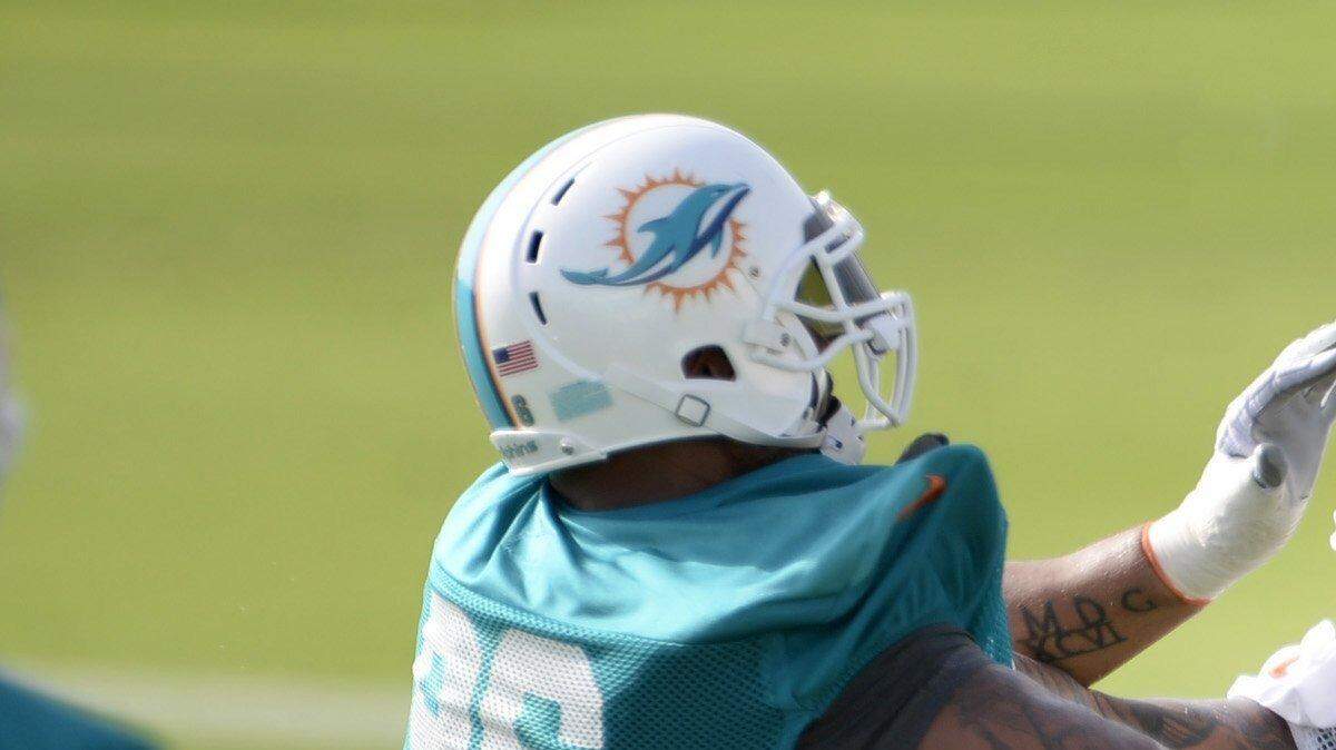 Jamil Douglas, right, blocks defensive lineman A.J. Francis during training camp. Douglas will start at right guard for the Miami Dolphins in the season opener against the Redskins on Sunday, Sept. 13, 2015.