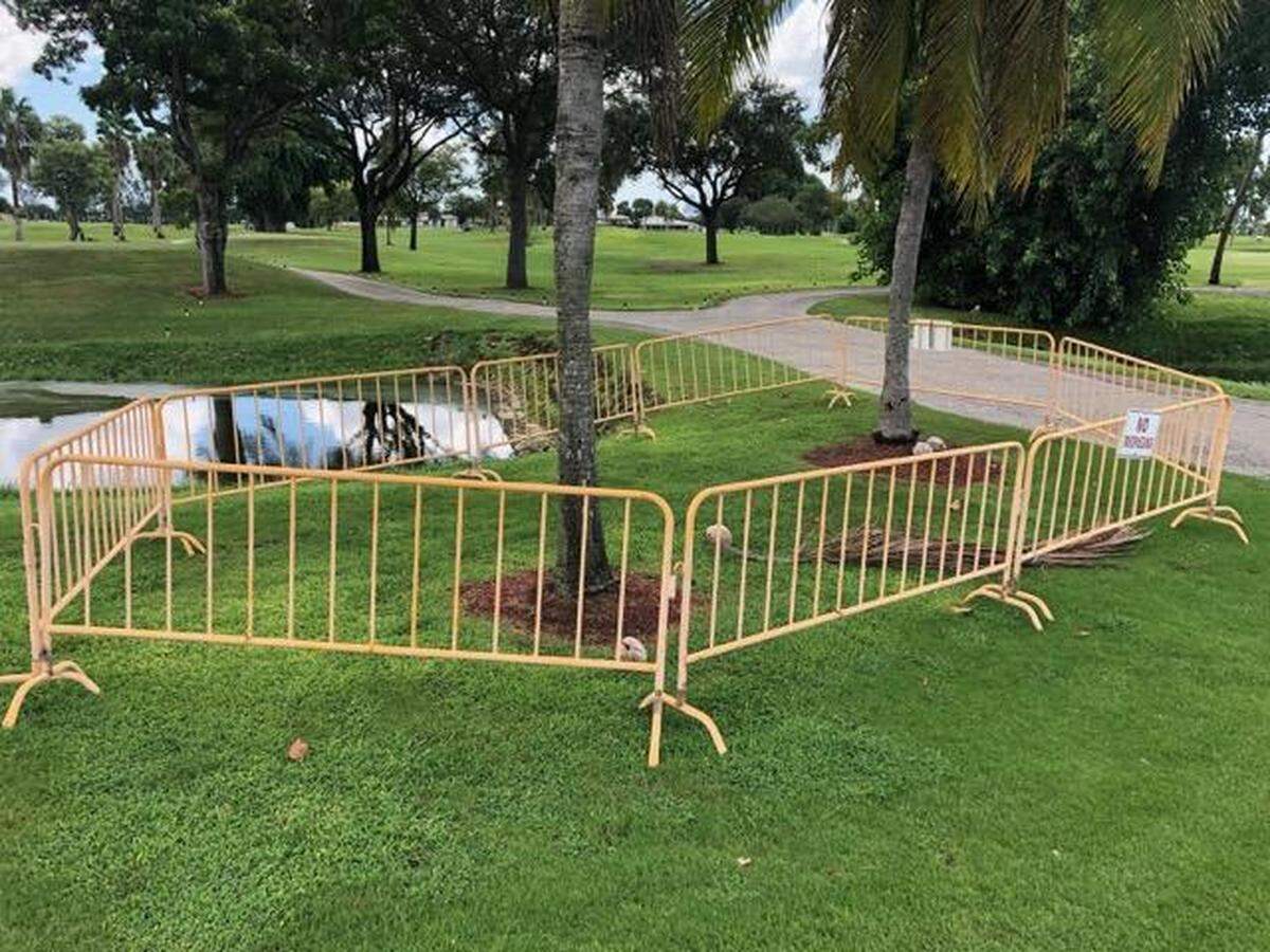 A fenced-off area at Melreese Country Club last week, one of four contaminated spots that must be cleaned up. Miami-Dade last month ordered the city to address “areas of concern” where high levels of arsenic and debris were found at Melreese Country Club