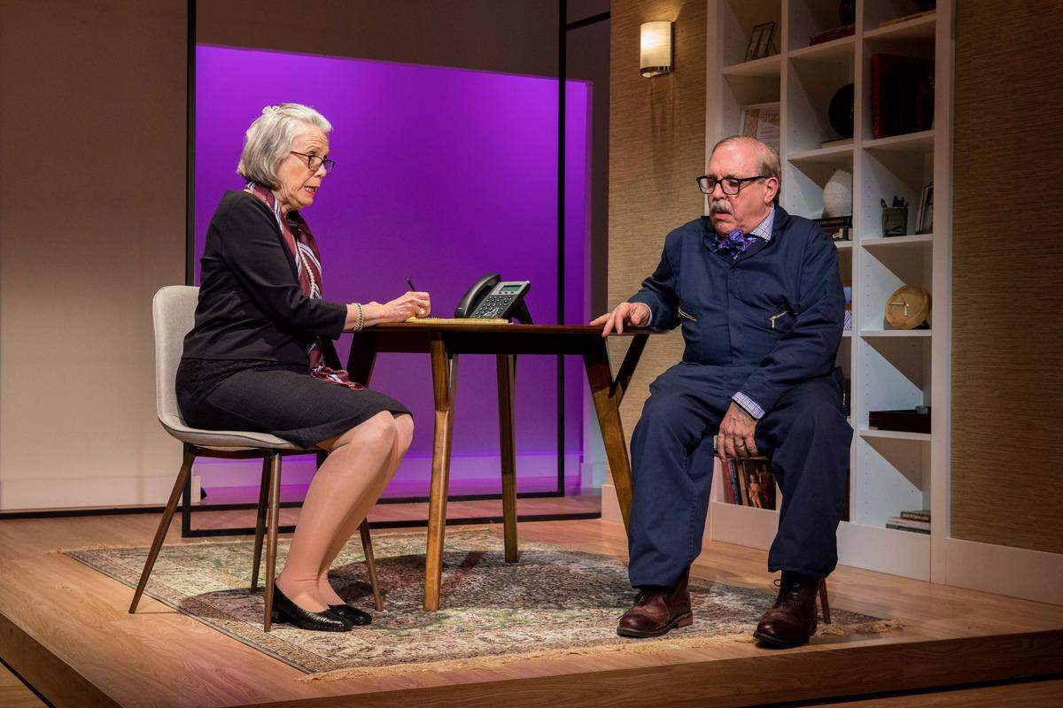 Carole Monferdini as an auction house executive has a word with James Puig as the warehouse supervisor in Miami New Drama’s world premiere of Carmen Pelaez’s ‘Fake.’