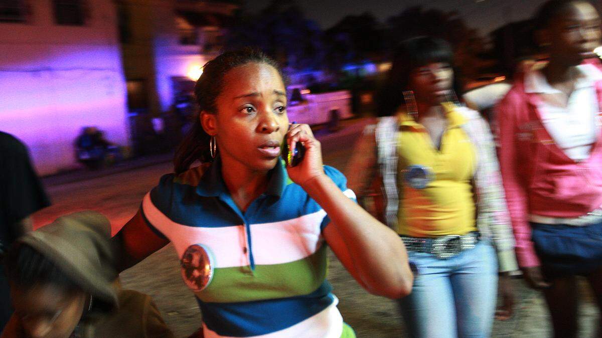 Tangela Johnson, mother of Derrick Gloster, 18, who was shot and killed in 2009 in Liberty City, walks from house to house appealing for help from the community in hopes of finding her son’s killer, Jan 28, 2009.