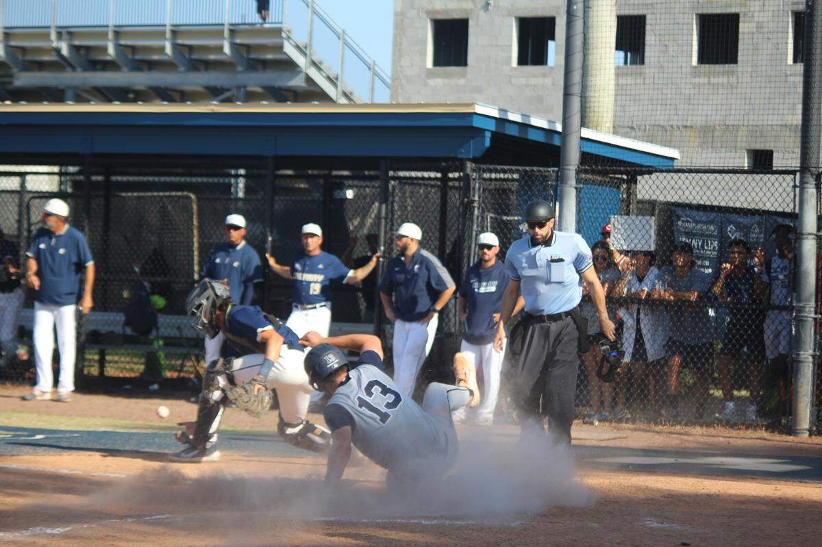 Luca Mendez slides home safely with Gulliver’s second run in the sixth inning of a 2-0 win over Calvary Christian in the Region 4-3A baseball final on Tuesday evening in Fort Lauderdale.