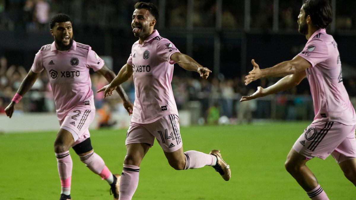 Inter Miami forward Corentin Jean (14), center, celebrates with defender DeAndre Yedlin (2) and midfielder Rodolfo Pizarro (20) after scoring a goal against Philadelphia Union during the first half of an MLS game at DRV PNK Stadium on Saturday, March 4, 2023, in Fort Lauderdale, Fla.