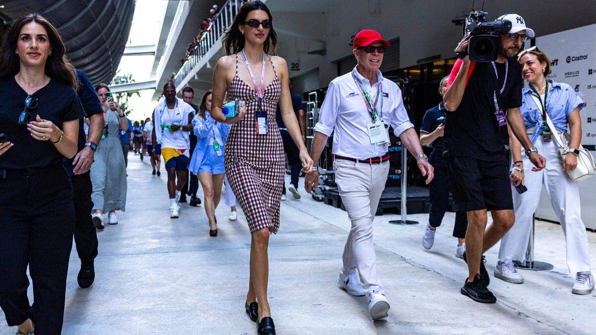 American fashion designer Tommy Hilfiger, right, media personality Kendall Jenner, left, walk through the paddock during day one of Formula One Miami Grand Prix at the Miami International Autodrome on Friday, May 3, 2024, in Miami Gardens, Fla.