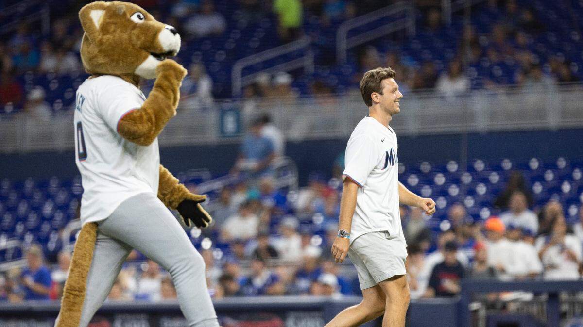 Sam Rinehart, from the Florida Panthers, throw the first pitch during a baseball game between the Miami Marlins and the Los Angeles Dodgers on Wednesday, Sept. 6, 2023, at loanDepot Park in Miami.