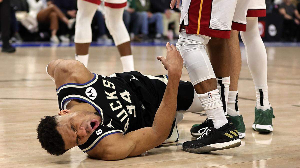 Giannis Antetokounmpo (34) of the Milwaukee Bucks is injured during Game One of the Eastern Conference First Round Playoffs against the Miami Heat at Fiserv Forum on April 16, 2023, in Milwaukee, Wisconsin.