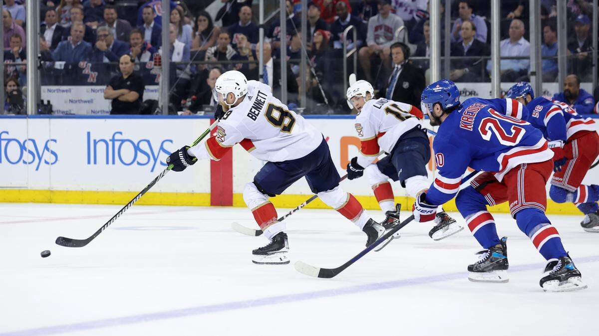 May 22, 2024; New York, New York, USA; Florida Panthers center Sam Bennett (9) scores an empty net goal against the New York Rangers during the third period of game one of the Eastern Conference Final of the 2024 Stanley Cup Playoffs at Madison Square Garden. Mandatory Credit: Brad Penner-USA TODAY Sports