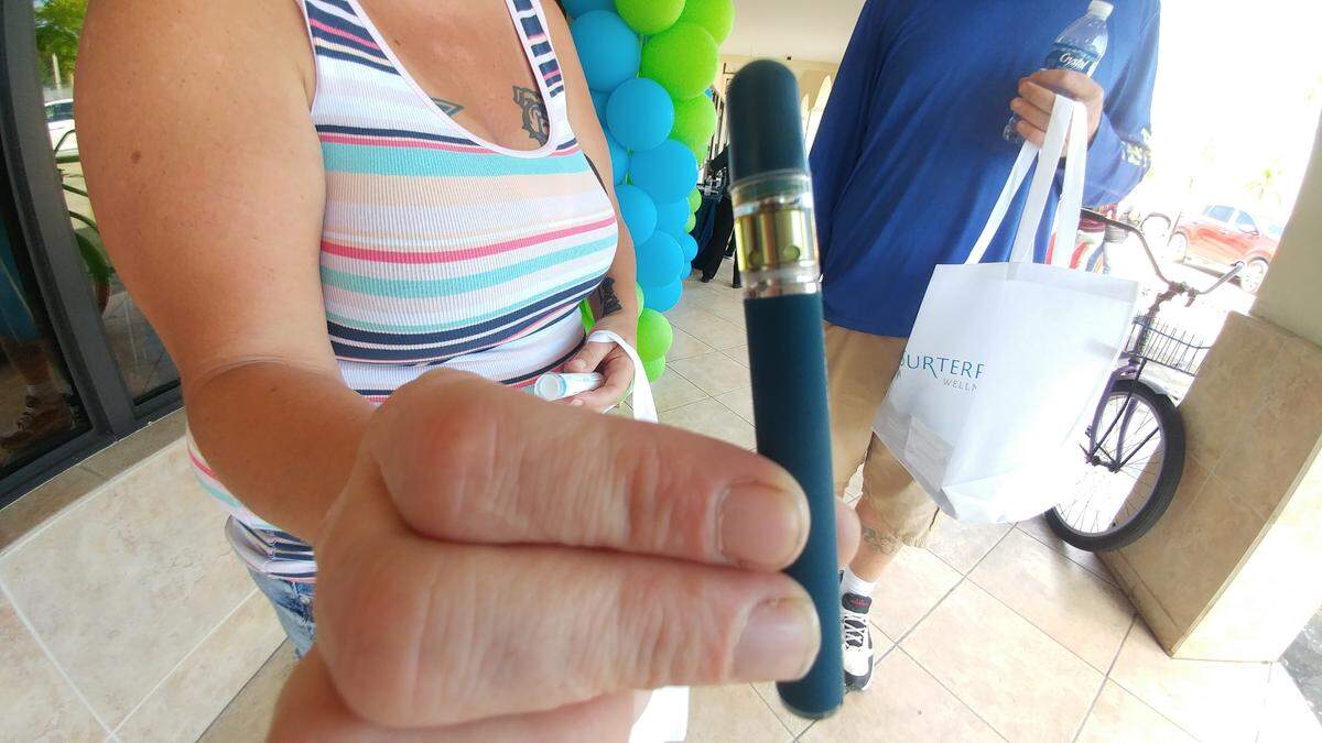 A medical-marijuana patient bought cannabis oil Thursday, April 11, 2019, at the first cannabis store to open in the Keys.