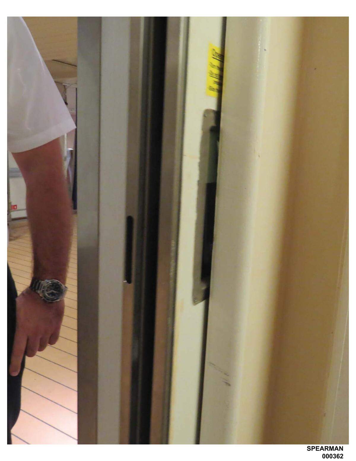 When the door on Royal Caribbean's Voyager of the Seas slid back into its recess pocket in the wall, like an elevator door opening, it mashed Lisa Spearman's hand into a space only big enough to fit a pencil.