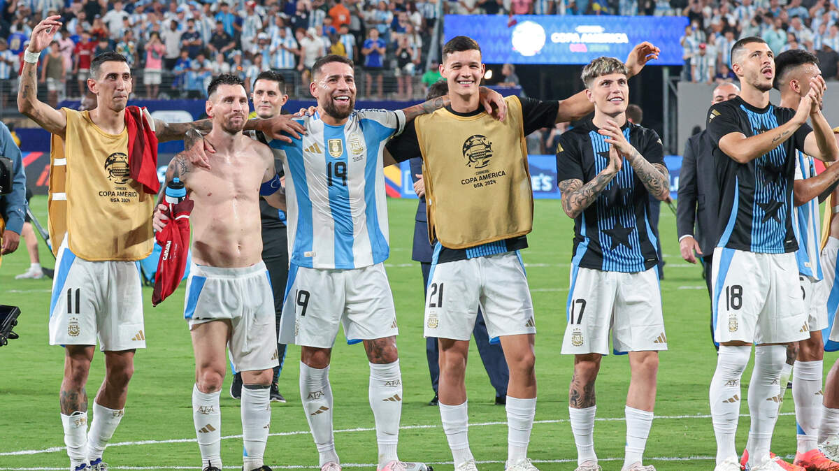Jul 9, 2024; East Rutherford, NJ, USA; Argentina forward Angel Di Maria (11) and forward Lionel Messi (10) celebrates with teammates after the match against Canada at Metlife Stadium. Mandatory Credit: Vincent Carchietta-USA TODAY Sports