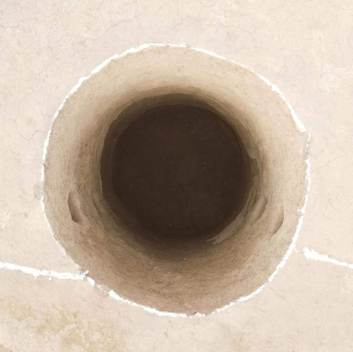 A water well discovered at the site.