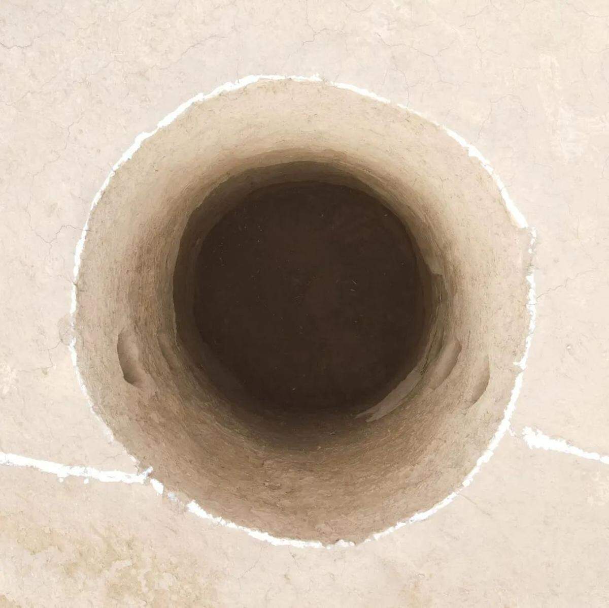 A water well discovered at the site.