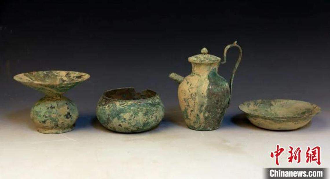 Green-colored pottery found at the cemetery.