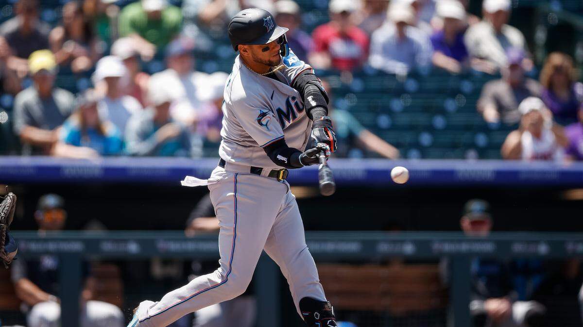 Miami Marlins first baseman Yuli Gurriel (10) this and RBI triple in the third inning against the Colorado Rockies at Coors Field on Thursday, May 25, 2023.