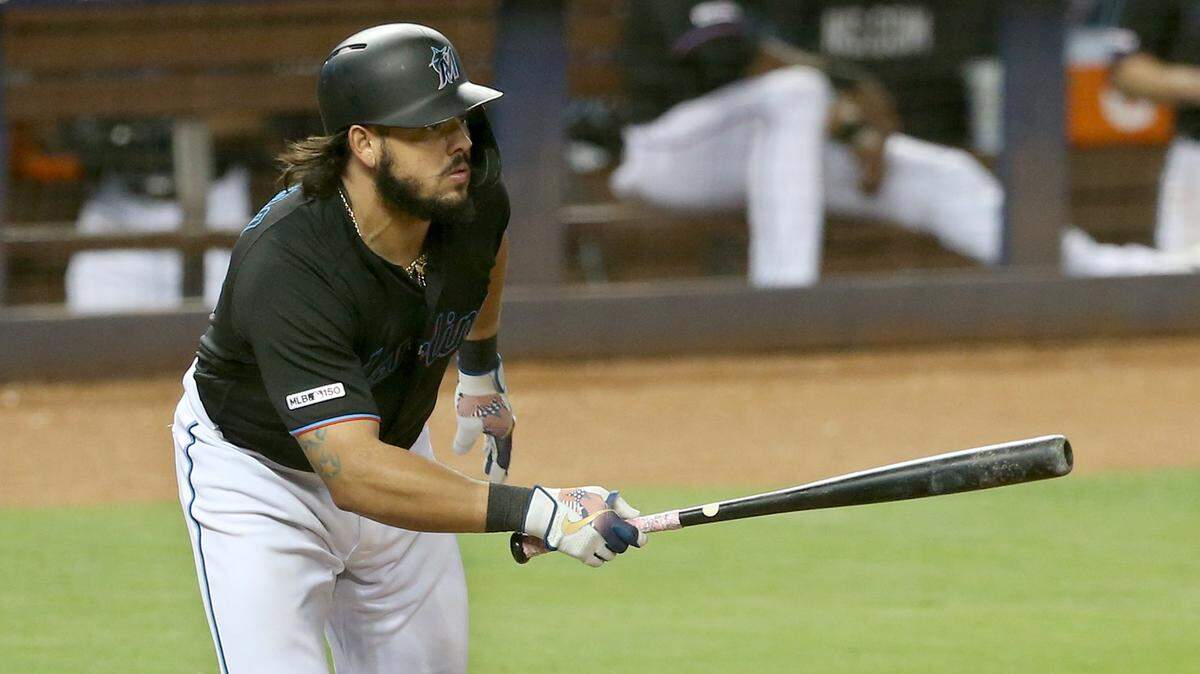 Miami Marlins catcher Jorge Alfaro hits an RBI triple to tie the game 2-2, in the fourth inning of the Miami Marlins vs New York Mets, game at the Marlins Park in Little Havana in Miami on Saturday July 13, 2019.