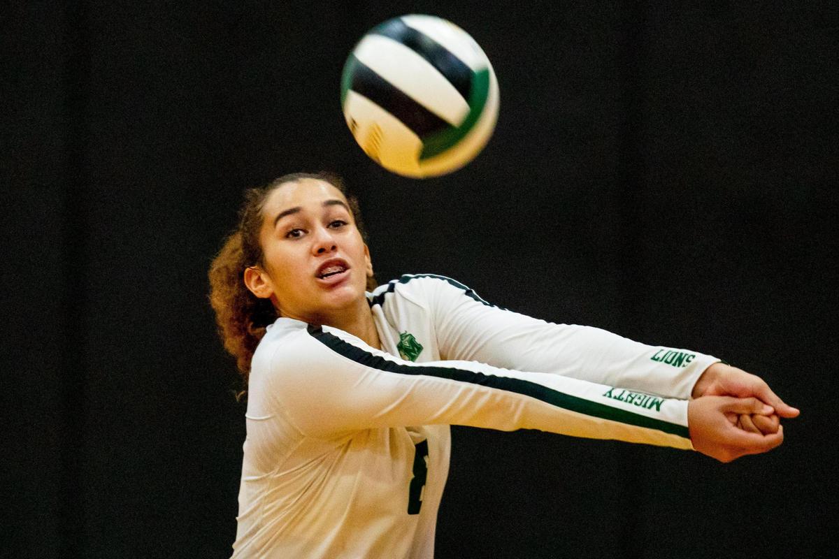 Mater Academy senior opposite hitter Taylor Pgan (8) returns the serve during the FHSAA Class 6A girls’ volleyball state semifinal match against Fort Myers Green Wave at Monsignor Edward Pace High School gym, in Miami Gardens, Florida, on Saturday, November 7, 2020. The Hialeah Gardens Mater Academy Charter Lions defeated Fort Myers Green Wave 3-2.