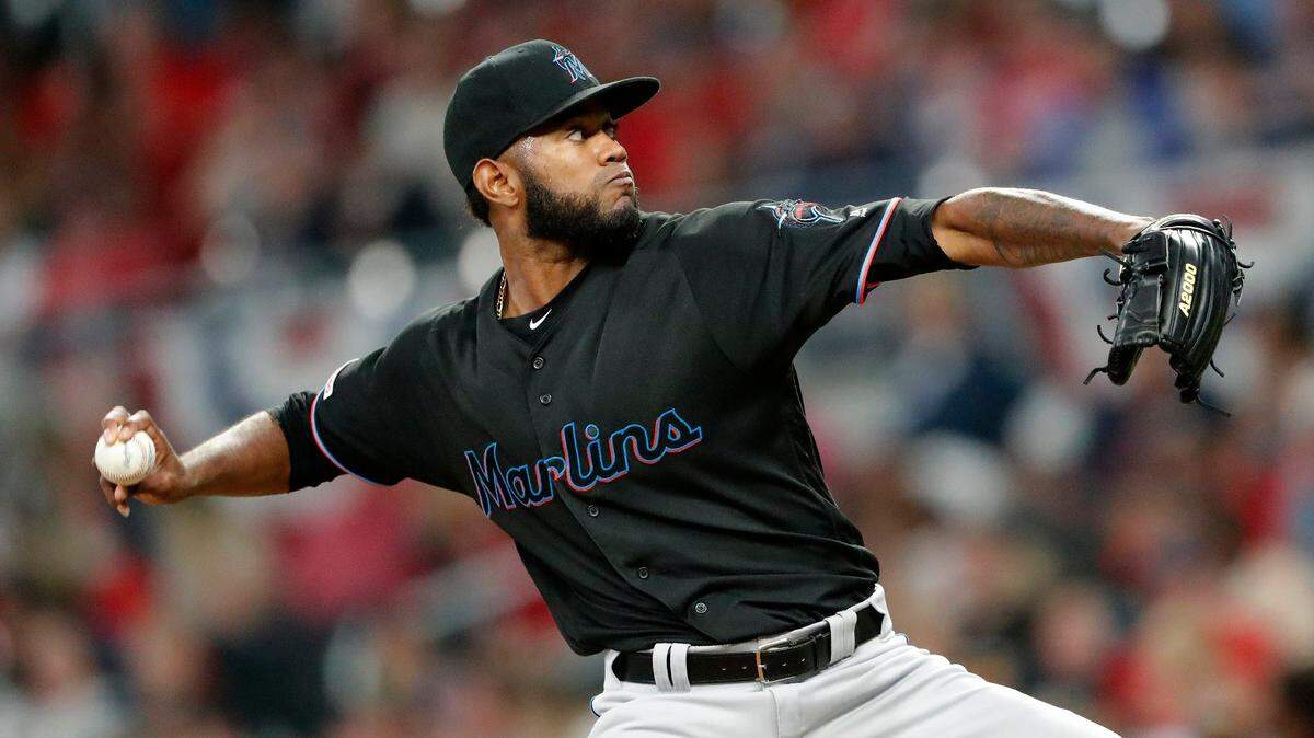 Miami Marlins relief pitcher Tayron Guerrero works in the eighth inning of the team’s baseball game against the Atlanta Braves on Friday, April 5, 2019, in Atlanta. The Braves won 4-0. (AP Photo/John Bazemore)