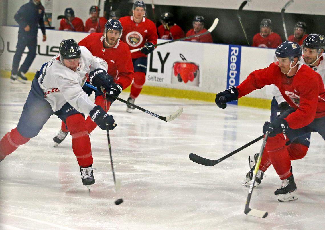 Florida Panthers Mark Pysyk (13) shoots the puck at their practice facility at the Ice Den in Sunrise, Florida, July 17, 2020.