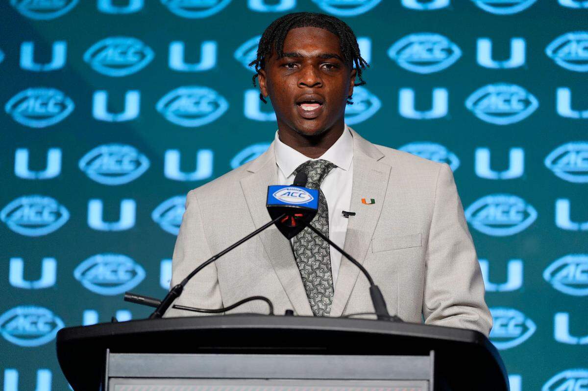 Jul 24, 2024; Charlotte, NC, USA; Miami Hurricanes quarterback Cam Ward speaks to the media during the ACC Kickoff at Hilton Charlotte Uptown. Mandatory Credit: Jim Dedmon-USA TODAY Sports