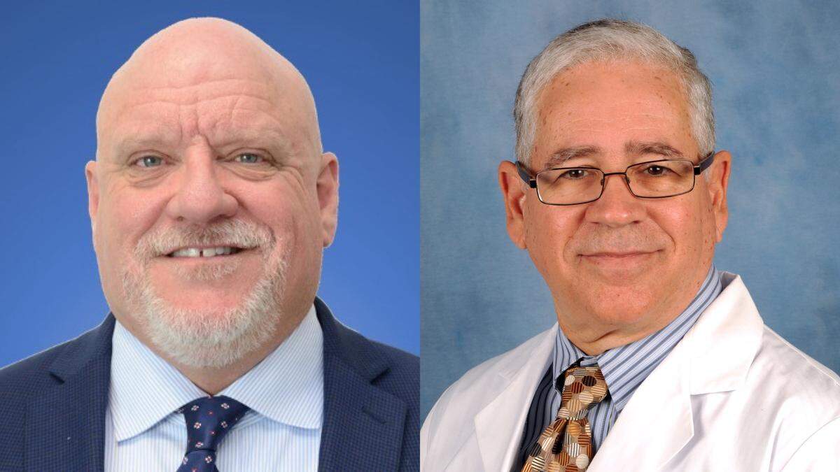(Left to right) Dr. Ronald Ford, chief medical officer at Joe DiMaggio Children’s Hospital in Hollywood and Dr. Otto Ramos, director of pediatric infectious diseases and virus laboratory at Nicklaus Children’s Hospital near South Miami.