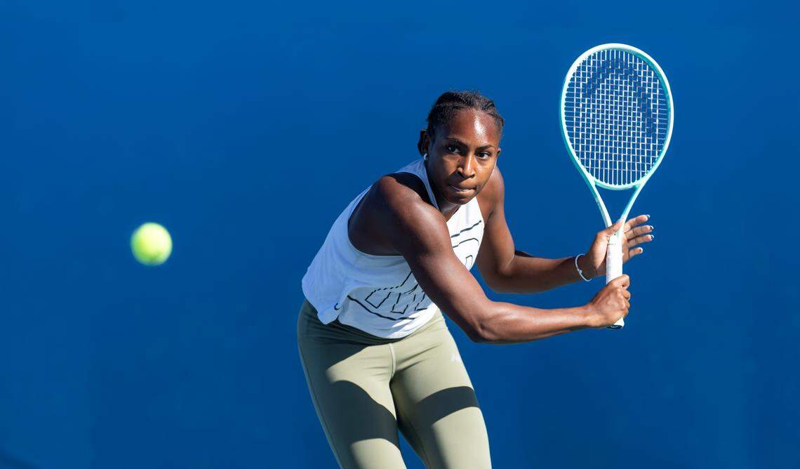 Coco Gauff, of the United States, returns a ball to Danielle Collins, of the United States, during a practice session at the Miami Open tennis tournament on Tuesday, March 18, 2025, at Hard Rock Stadium in Miami Gardens, Fla.