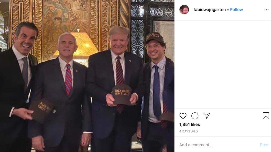 Fabio Wajngarten, Brazil’s Communications Secretary, poses next to President Donald Trump at a dinner at Mar-a-Lago on March 7, 2020.