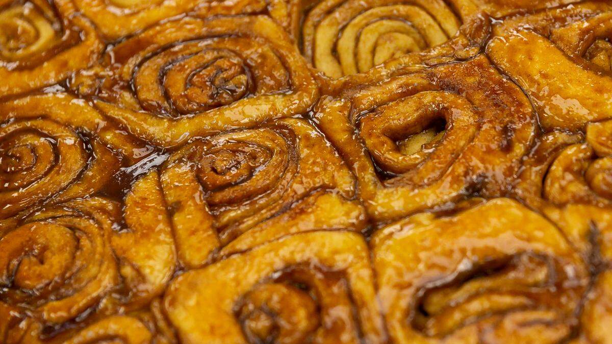 Cinnamon rolls are prepared at Knaus Berry Farm during their opening day in Homestead, Florida, on Tuesday, Oct. 26, 2021.