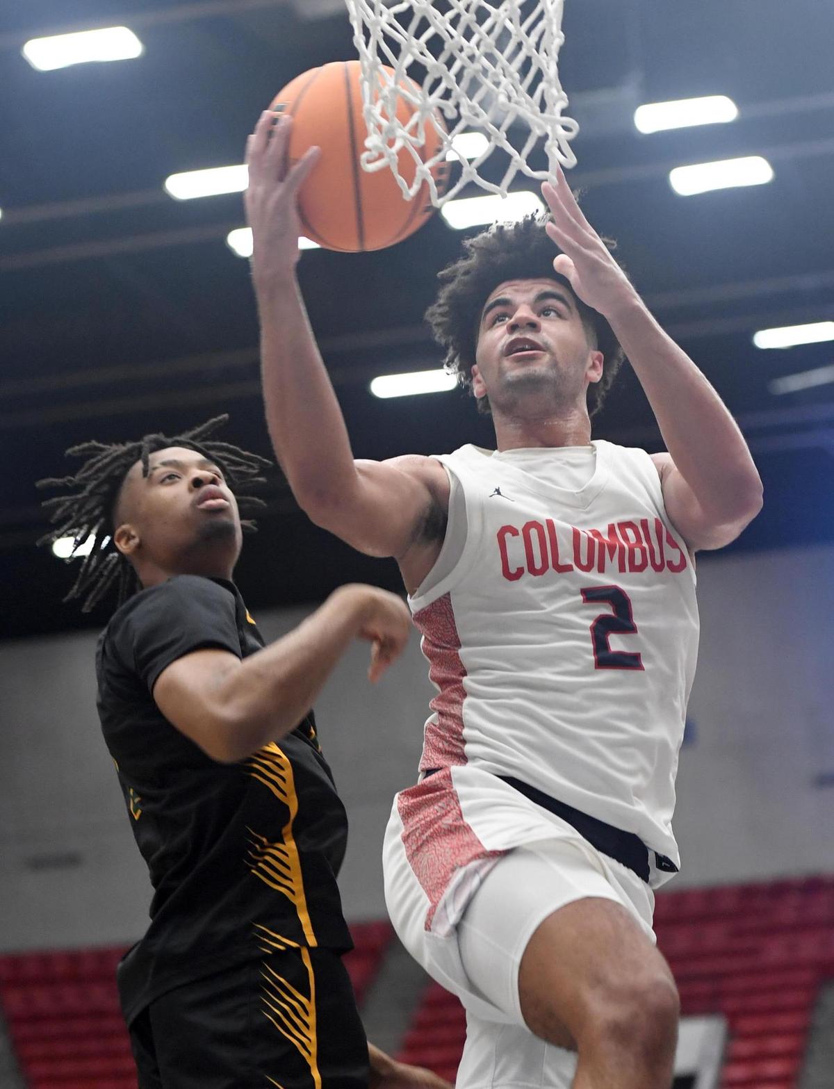 Columbus’ Cayden Boozer (2) shoots against Oak Ridge in the Class 7A final during the Florida High School State Championships at the RP Funding Center in Lakeland, Fl on Saturday March 9, 2024. Columbus defeated Oak Ridge 72-67 in overtime. Scott Wheeler | Photo