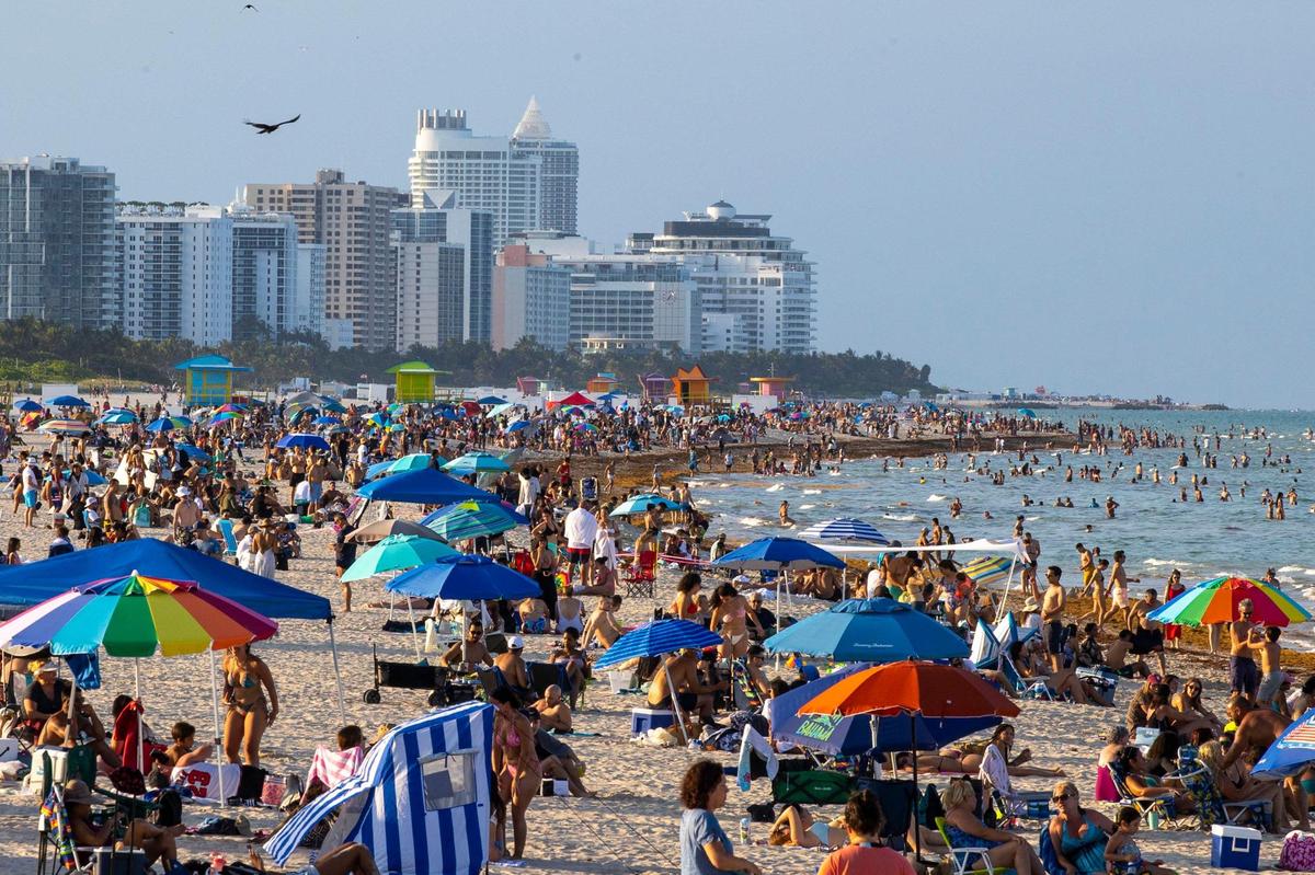 Beachgoers in Miami Beach, Florida, on Saturday, June 18, 2022.
