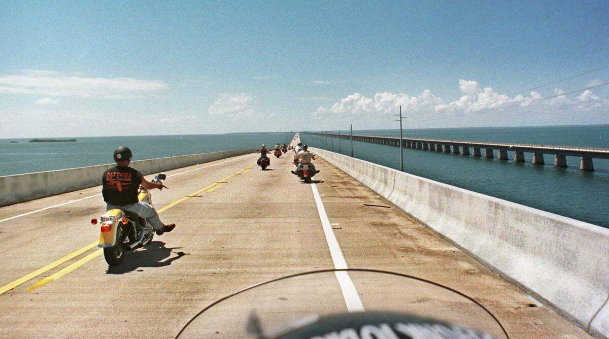 Riding along the Overseas highway at The Seven Mile Bridge, a group of riders from Georgia enjoy the 25th Annual Poker Run.