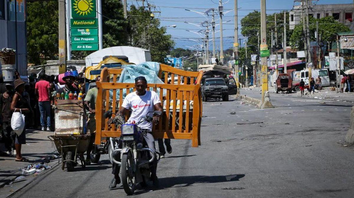 Gangs launched attacks in Haiti on Feb. 25, 2025. The attacks in the Delmas 30 neighborhood of Port-au-Prince sent residents running into the streets carrying bed frames and pushing wheelbarrows.