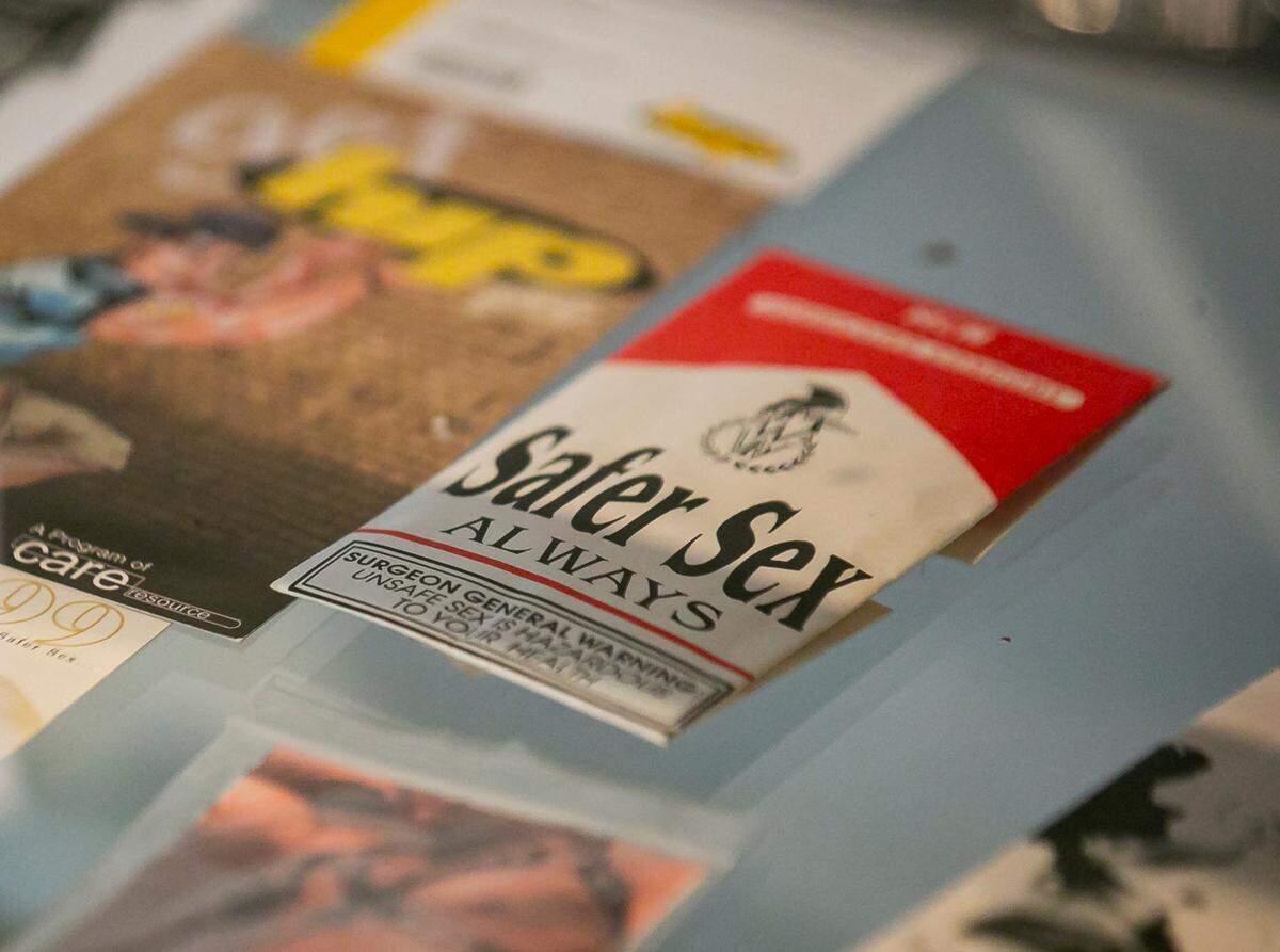 Various condom packages with messages are on display as part of the exhibit, A Matter of Time: Examining Forty Years of AIDS While Living through a Pandemic, at the Coral Gables Museum in Miami, Florida on Monday, April 5, 2021.