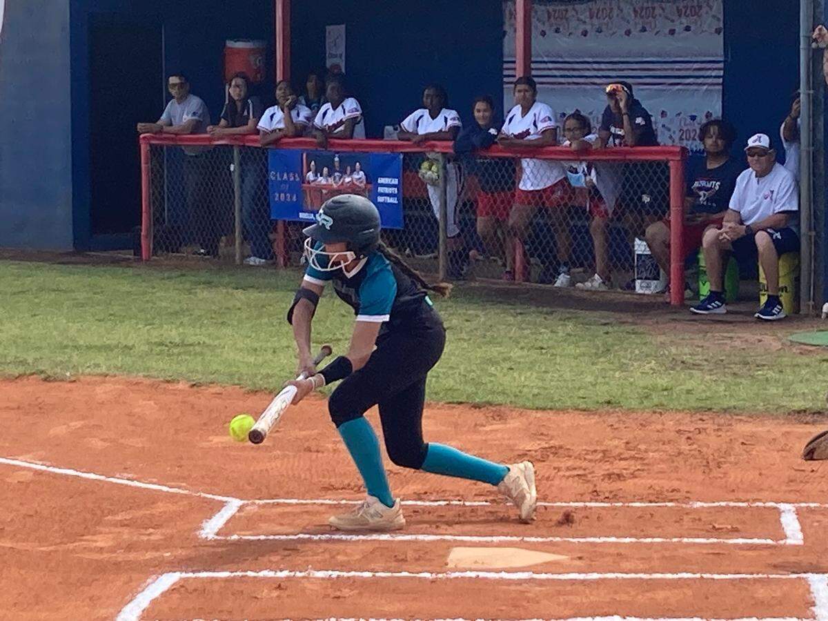 Coral Reef’s Bri Perantoni leads off Thursday’s game with a bunt single. Perantoni helped the Barracudas beat American to win the GMAC softball championship at American High.