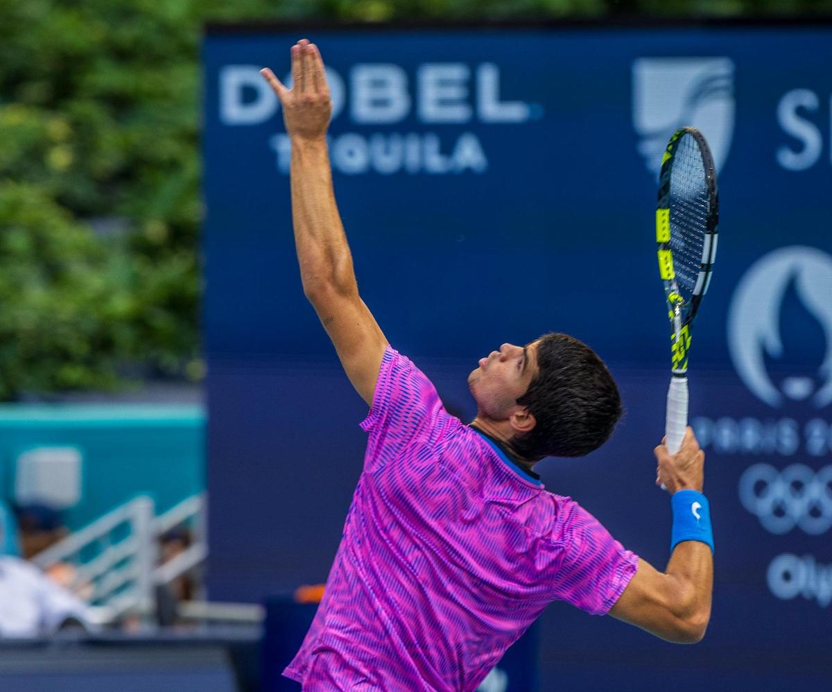 Carlos Alcaraz, of Spain, serves against Lorenzo Musetti, of Italy, during the men’s single 4th round at the Miami Open tennis tournament, on Tuesday, March 26, 2024.