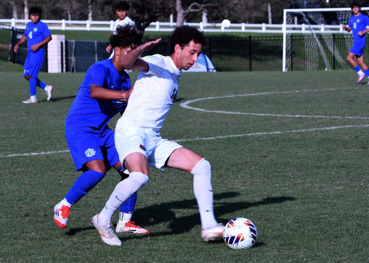 Mater Lakes senior midfielder Sage Medina fields a ball off his chest during the Class 4A state championship game against Barron Collier on Friday at Lake Myrtle Sports Complex on Friday.