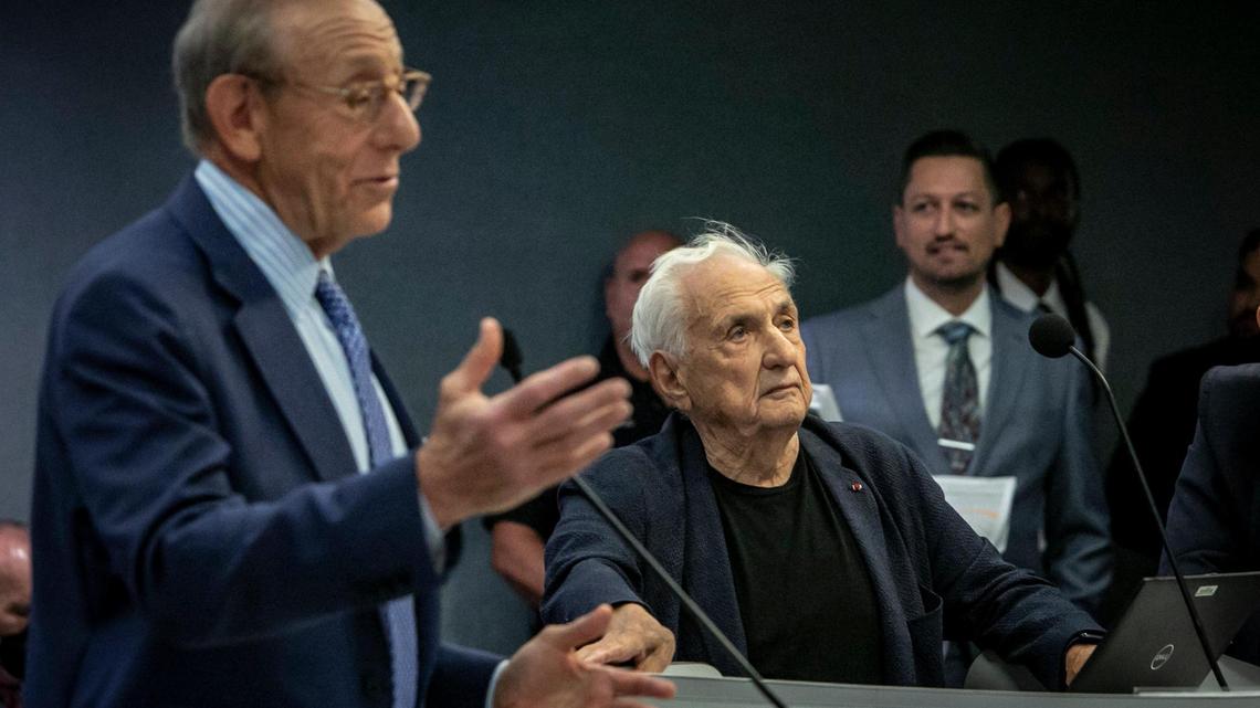 Dolphins owner Stephen Ross, left, speaks to the Miami Beach Commission on Wednesday, July 20, 2022, as architect Frank Gehry listens before the start of a presentation regarding the development of the Deauville site in Miami Beach.