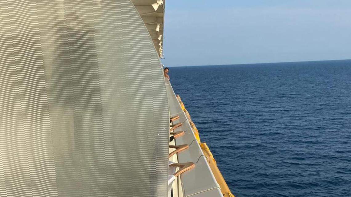 Laundry hangs to dry on the balcony of a crew member on the Oasis of the Seas on May 1, 2020. Around 100,000 crew members remain trapped on cruise ships in and around U.S. waters as cruise executives refuse to sign agreements with CDC to let them off.