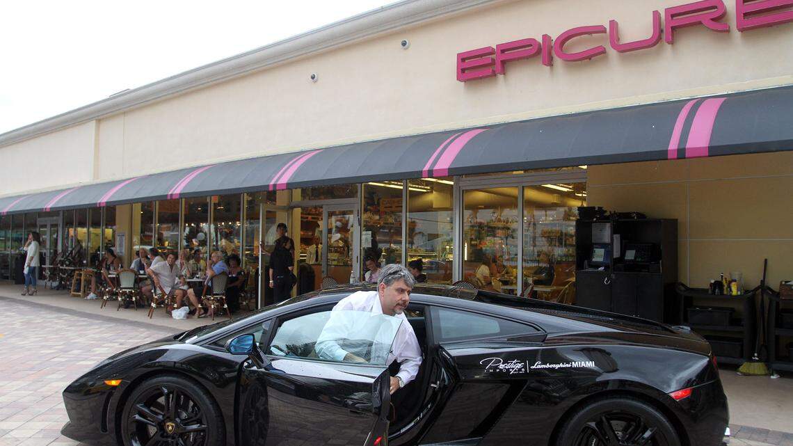 Dominick Raneri, finance director at Prestige Imports, parks a Lamborghini at Epicure Sunny Isles Beach for a car event in 2011.