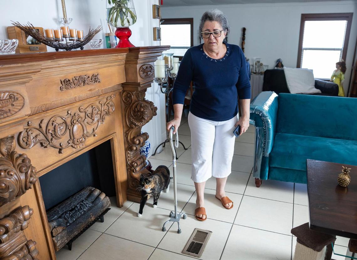 Vivian Hernandez, 61, who began using a cane to walk after a rough arrest, is seen at her home in the Li’l Abner Mobile Home Park on Saturday, Dec. 21, 2024, in Sweetwater, Florida. Police said she was arrested at the park’s management office after refusing to leave following a dispute with employees.