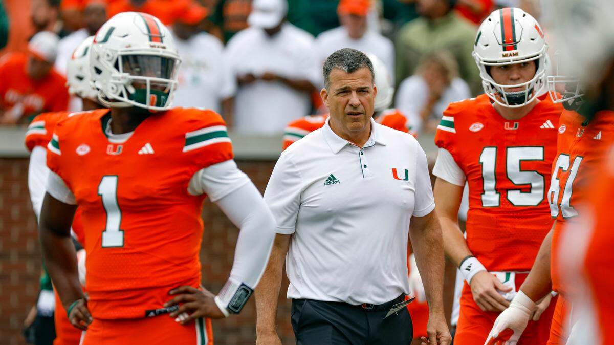 Miami Hurricanes head coach Mario Cristobal on the field before the game against the Georgia Tech Yellow Jackets during an NCAA game at Bobby Dodd Stadium at Hyundai Field in Atlanta, Georgia on Saturday, November 9, 2024.