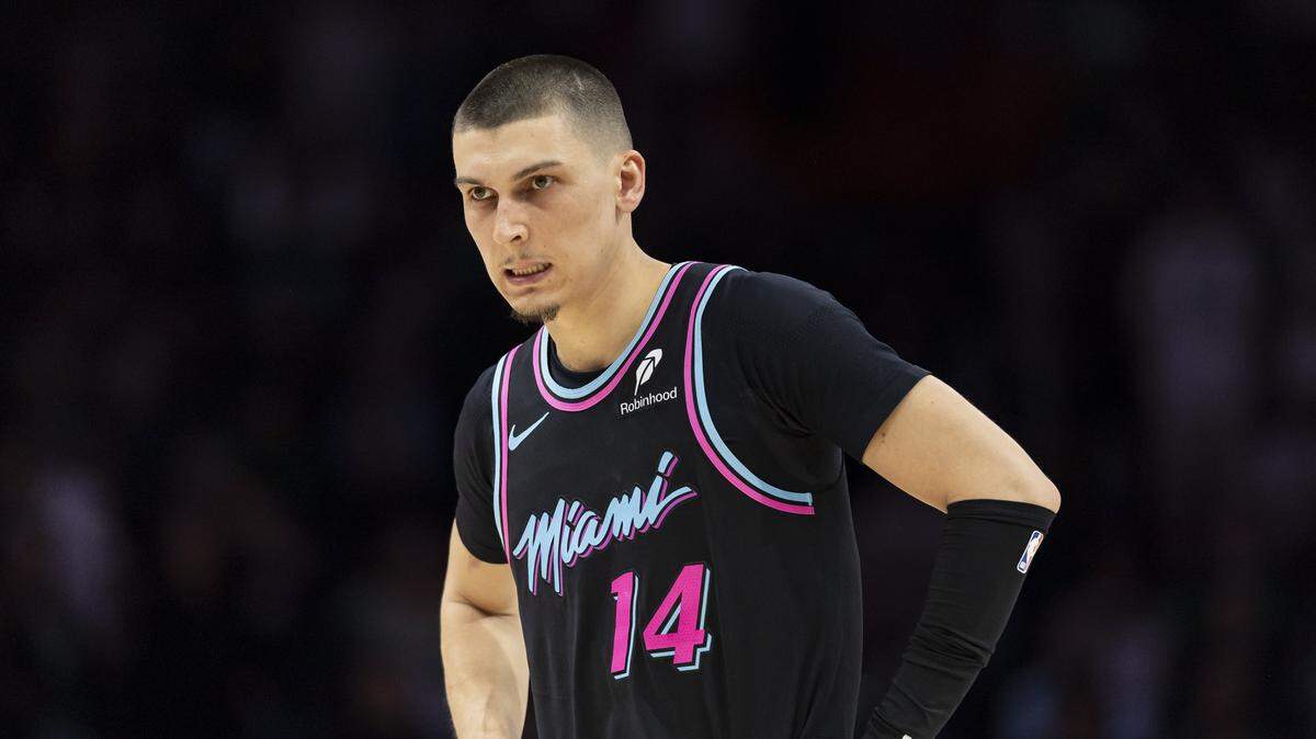 Miami Heat guard Tyler Herro (14) reacts after a play against the Boston Celtics in the second half of their NBA game at the Kaseya Center on Thursday, Jan. 15, 2026, in downtown Miami, Fla.