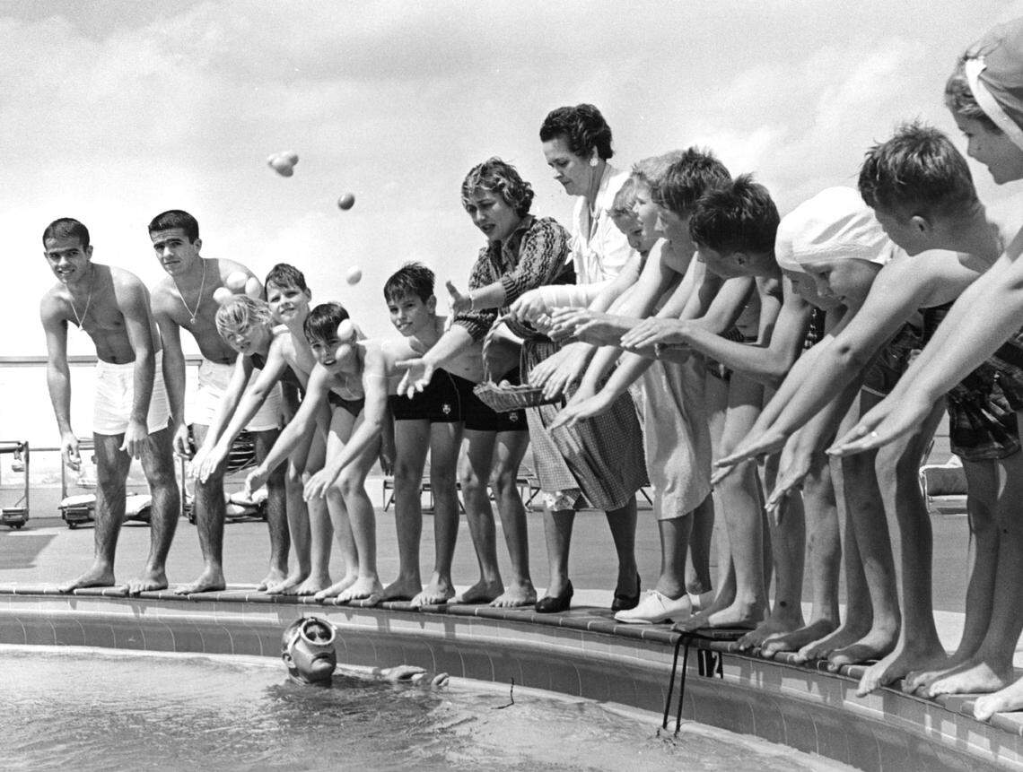 Twins contest and an underwater egg hunt at the Everglades pool in 1960.