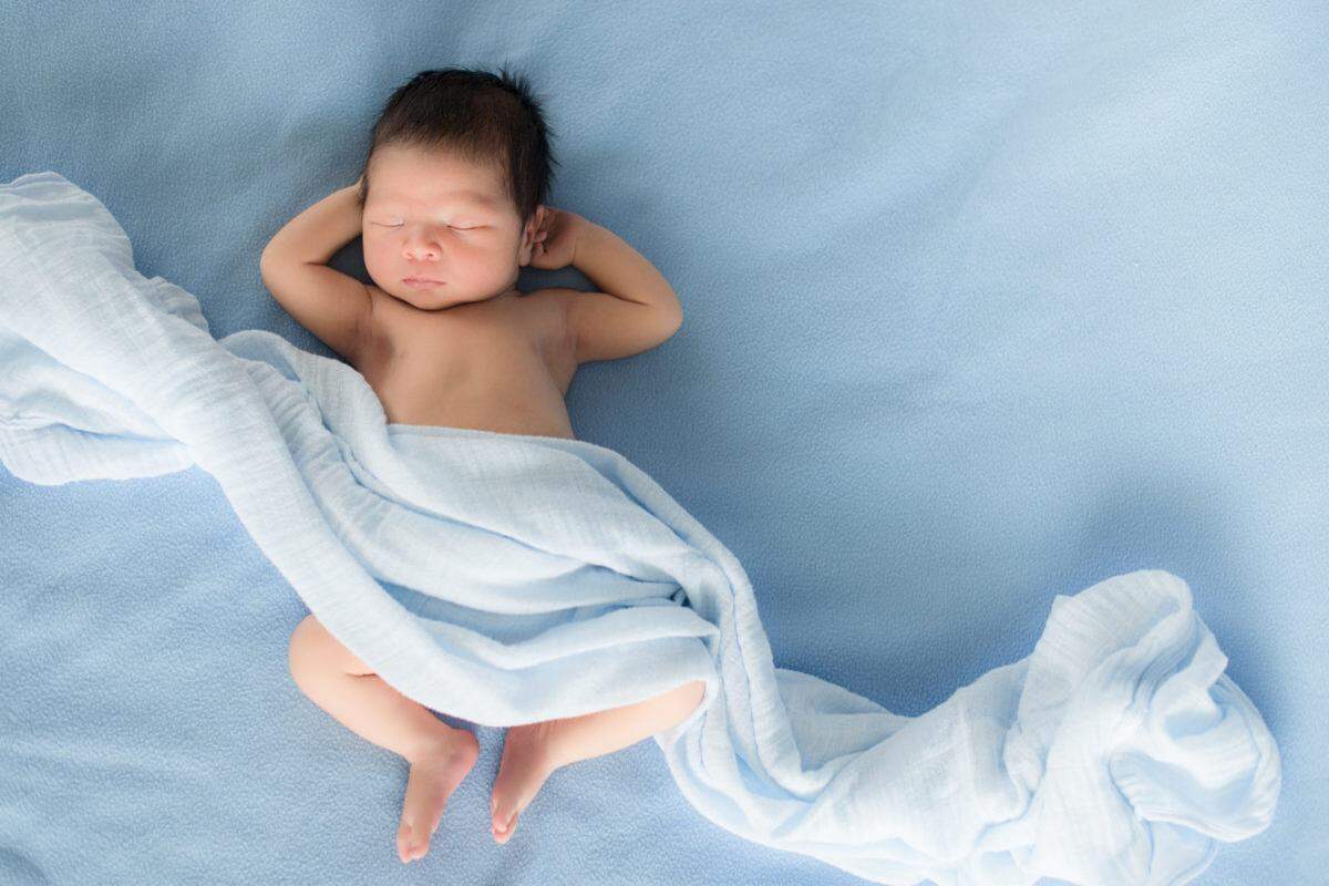 Newborn baby in blue