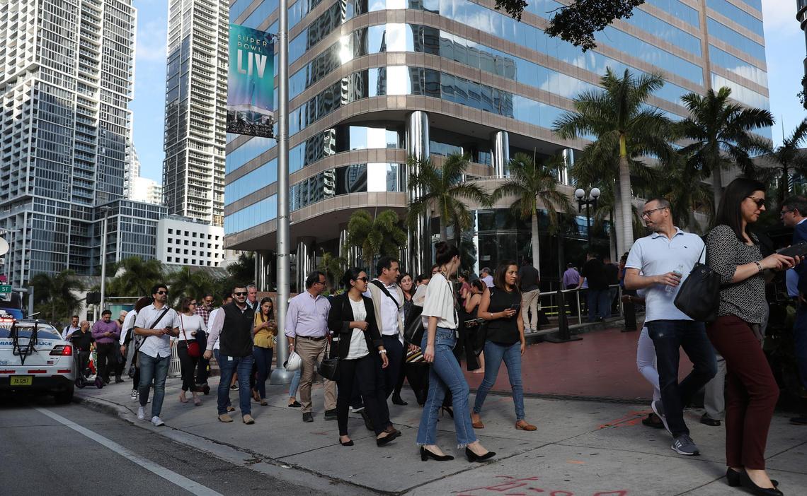 People evacuate office buildings in Miami Tuesday after an earthquake struck south of Cuba and northwest of Jamaica. The earthquake registered magnitude 7.7, according to the U.S. Geological Survey.