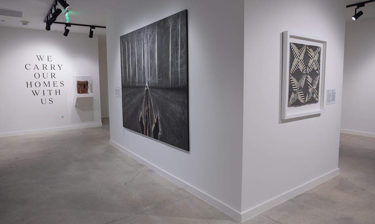 “We Carry Our Homes With Us” is an exhibition inspired by Cuban exile Marisella Veiga's memoir on display inside the Miami Dade College’s Freedom Tower. It features art from internationally renowned artists like José Bedia, Maria&nbsp;Martinez-Cañas, Félix&nbsp;González-Torres, Ana&nbsp;Mendieta, and Tomm El-Saieh.  