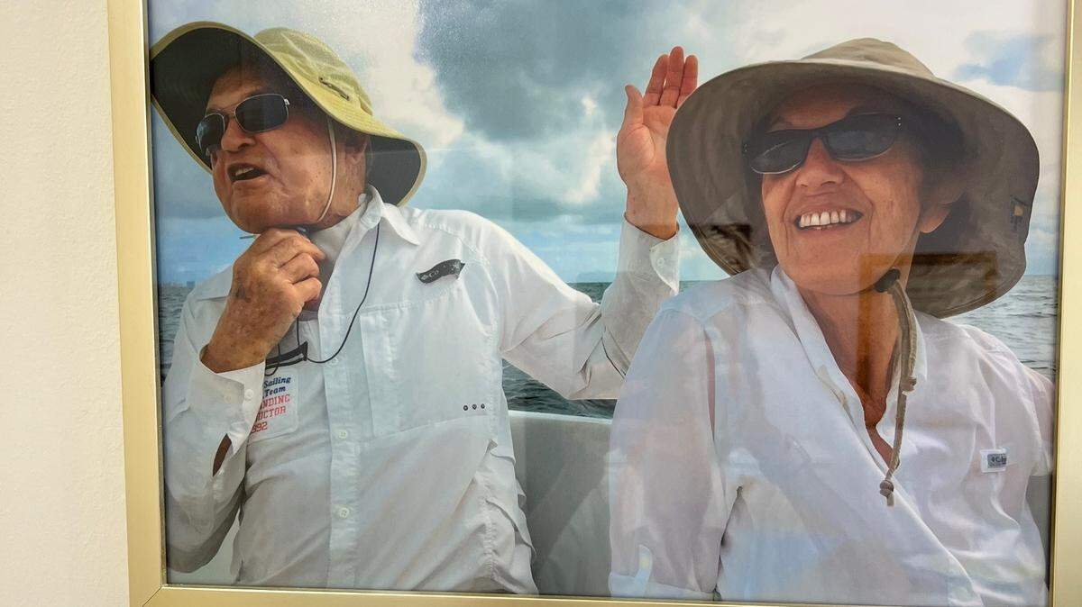Taylor Larimore, left, and his longtime companion Taffy Gould on a sailboat in Biscayne Bay.