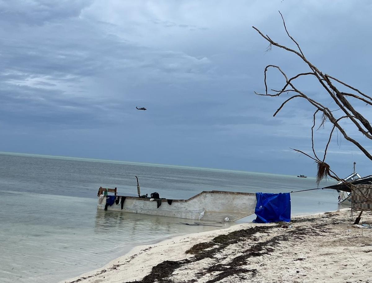 Cuban migrant boats are tied to trees on a beach in the Marquesas in the Lower Florida Keys Wednesday, Oct. 19, 2022.